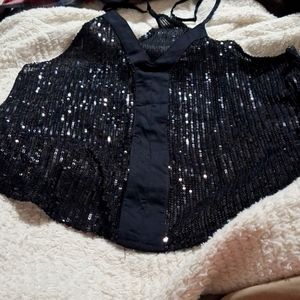 A sheer black sequence medium never worn does not have tags